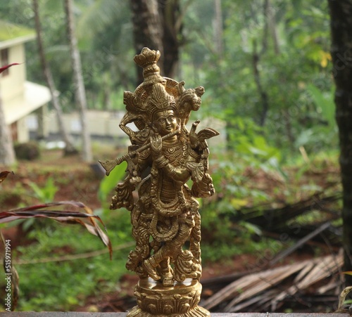 Canvas Print Lord krishna brass idol in golden color