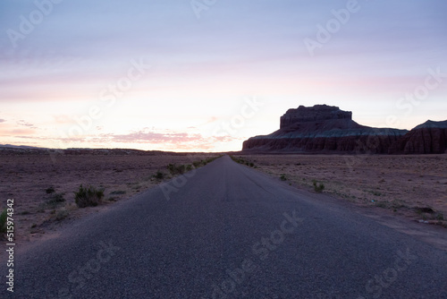 Scenic Road in Rocky Mountains in the Desert at Sunrise. Spring Season. Goblin Valley State Park. Utah, United States. Nature Background.