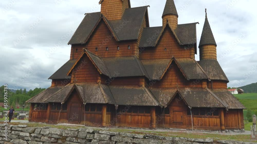heddal stave church wood cathedral built 1300 century triple nave tilt up cloudy sky norway heddal stave church wood cathedral built 1300 century triple nave tilt up cloudy sky norway