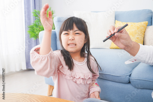 A little girl hates secondhand smoke photo