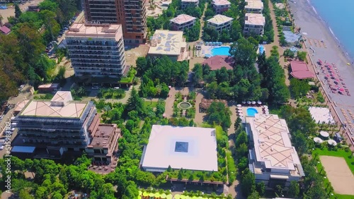 Beautiful view from the drone on the hotel grounds by the sea on a sunny day photo