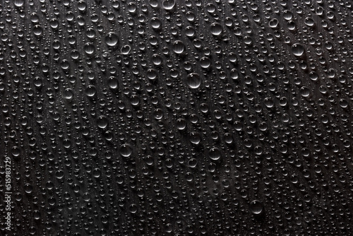 Abstract silver texture background with drops of water