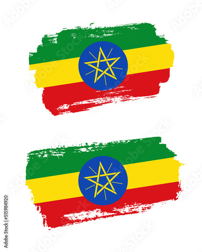 Set of two creative brush painted flags of Ethiopia country with solid background
