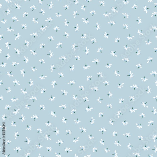 Simple vintage pattern. small white flowers. light blue background. Fashionable print for textiles and wallpaper.