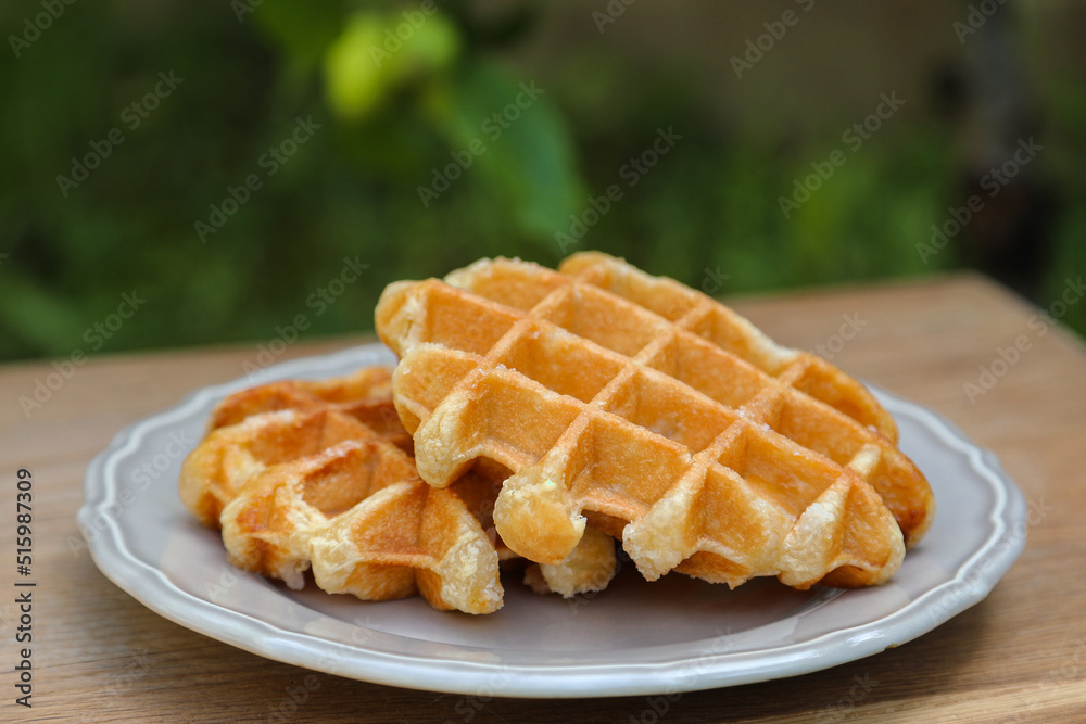 Belgian waffle with chocolate spread. Wafers. Dessert. American waffles. We made waffles at home. Breakfast. Coffee with waffles
Belgian waffle with chocolate spread. Wafers. Dessert. American waffles. We made waffles at home. Breakfast. Coffee with waffles