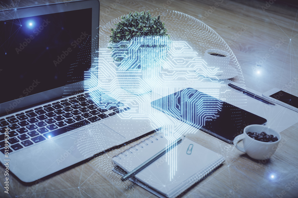 Double exposure of desktop with computer and brain drawing hologram. Artificial intelligence concept. Double exposure of desktop with computer and brain drawing hologram. Artificial intelligence concept.