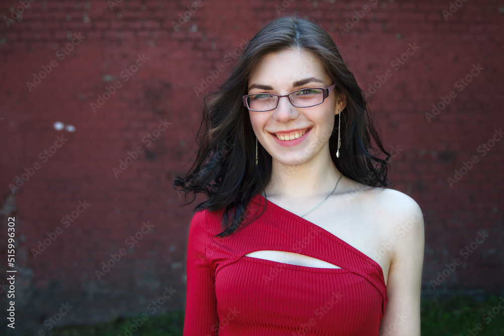 Fototapeta premium portrait of a young woman in the park