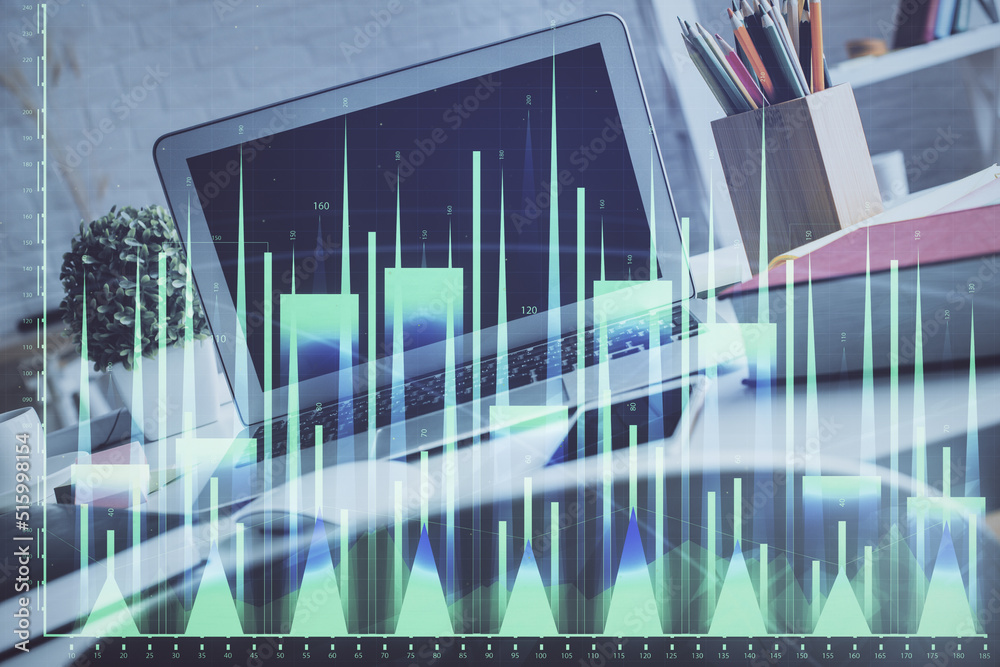 Forex market graph hologram and personal computer on background. Multi exposure. Concept of investment. Forex market graph hologram and personal computer on background. Multi exposure. Concept of investment.