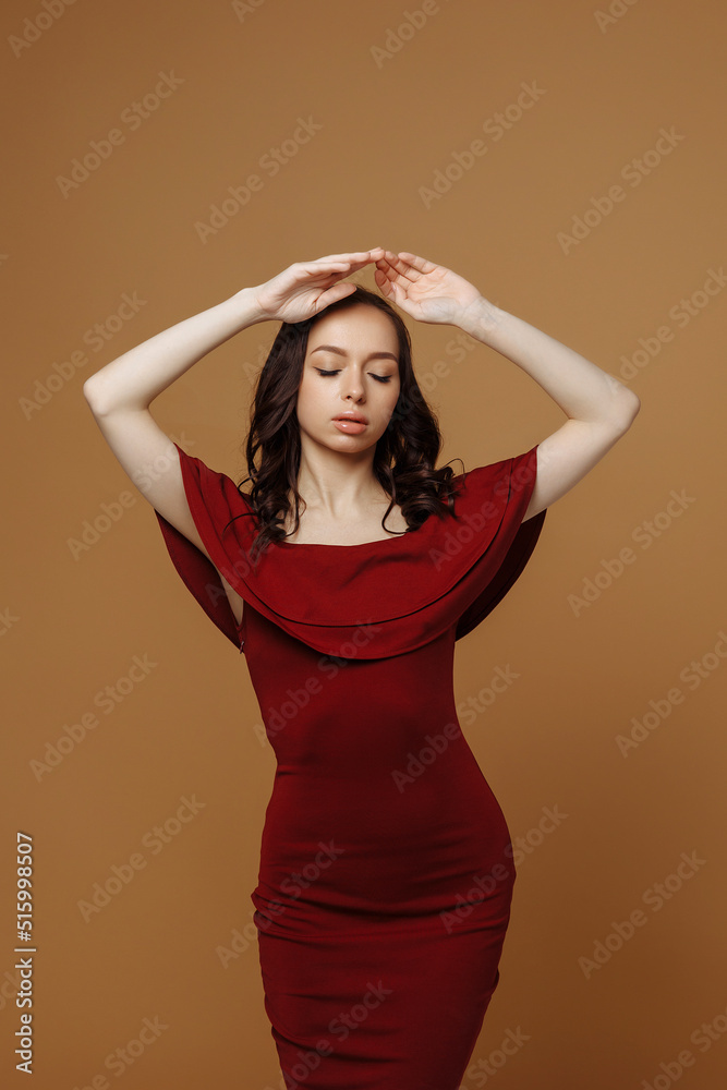 Beautiful woman in a red dress. Beautiful woman in a red dress.
