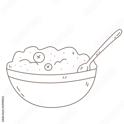 Bowl with porridge and berry and spoon.