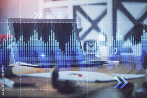 Forex market graph hologram and personal computer on background. Multi exposure. Concept of investment.