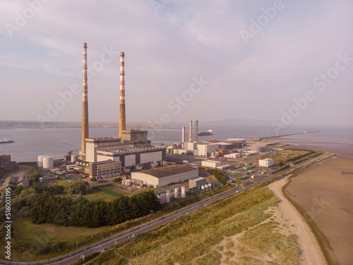 Canvas Print Aerial view of the famous chimney of Dublin  with foggy Poolbeg in the backgroun