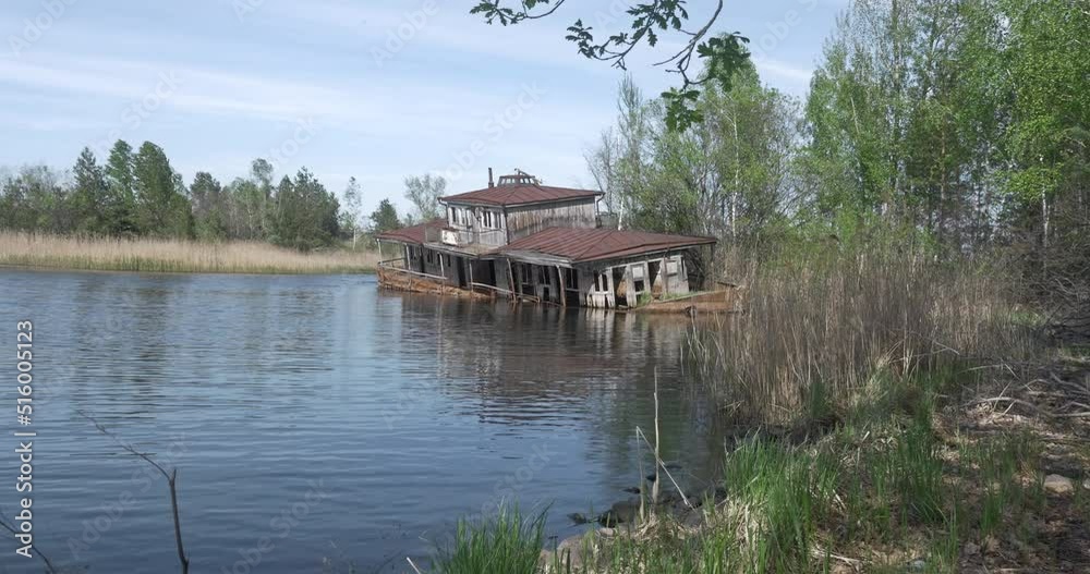 Abandoned sunken barge on the Pripyat River Abandoned sunken barge on the Pripyat River