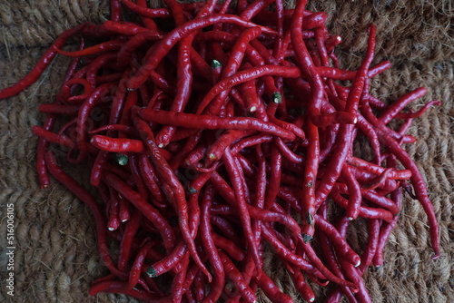 Red Chili is a fruit and plant member of the genus Capsicum