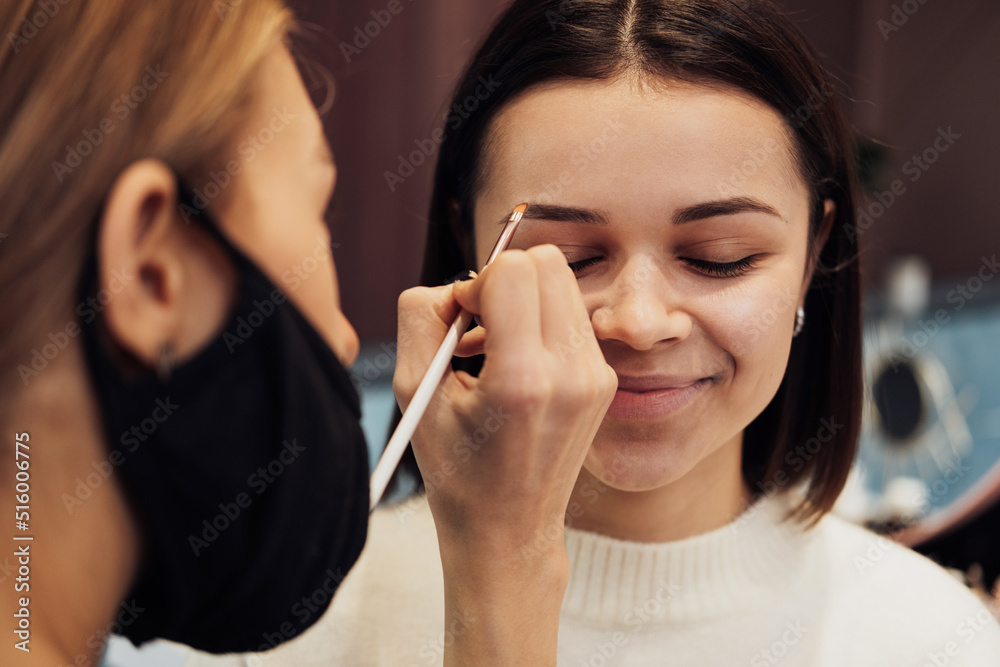 Close Up Female Make Up Artist Working with the Client Eyebrows, Young Woman in Beauty Salon with Brow Master Close Up Female Make Up Artist Working with the Client Eyebrows, Young Woman in Beauty Salon with Brow Master