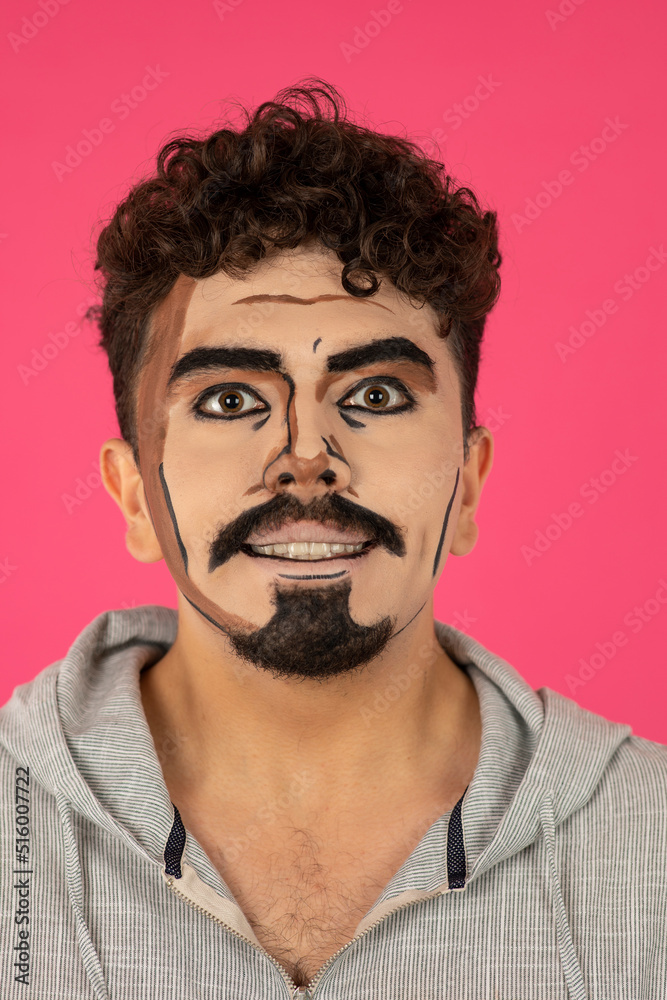 Close-up Portrait of a young guy with fantasy makeup