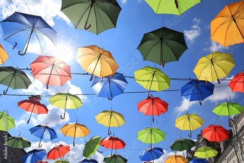 Installation "Umbrellas" in front of blue sky 