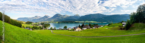 Lake Wolfgang (Wolfgangsee) in the region of Salzkammergut in the state of Salzburg in Austria with austrian alps