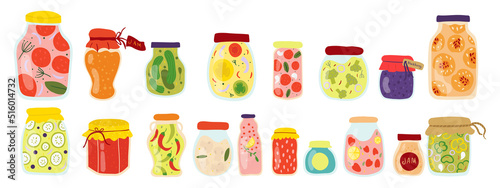 Homemade jars for preserving fruits and vegetables.A set of glass jars with canned vegetables, compotes and berry jams. Winter supplies. Autumn harvest season.