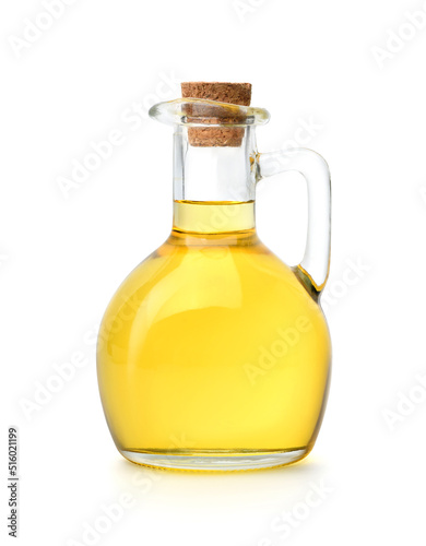 Bottle of cooking oil with cork cap isolated on white background. Clipping path. photo