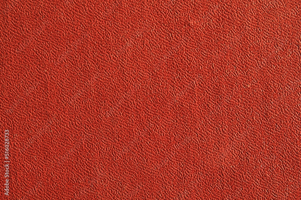 Fototapeta premium Abstract autumn design background of glossy artificial genuine textured brown creased leather. Flat surface. Skin natural wrinkled scratched wallpaper pattern. Close-up, mock up, top view