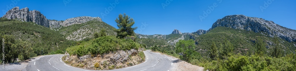 Curved mountain road and panorama view of the landscape around Curved mountain road and panorama view of the landscape around