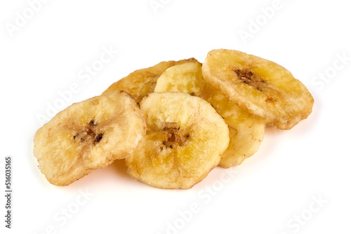 Dried banana slices, isolated on white background.