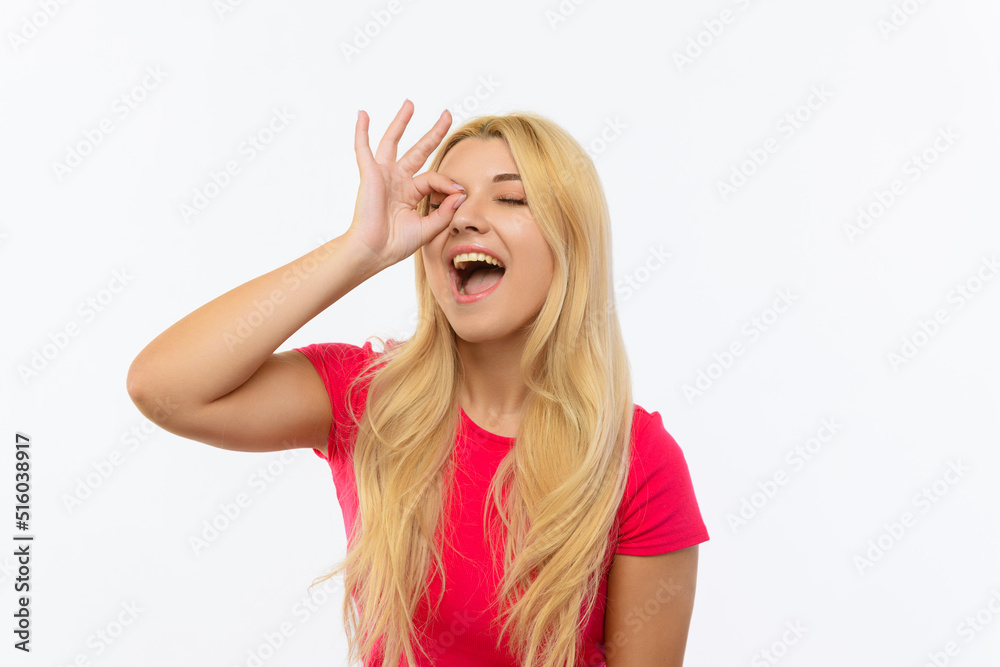 girl in a pink dress on a white background. It shows that everything is great