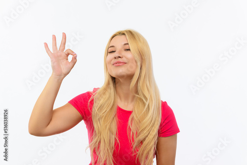 girl in a pink dress on a white background. It shows that everything is great