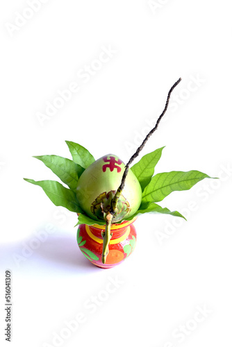 Derorative puja ghat isolated on white background.