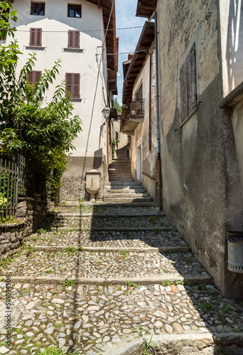 Narrow cobblestone streets with stone houses in the small ancient village Naggio in the province of Como  Lombardy  Italy