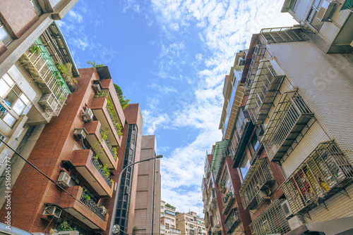 Three building between the road which constructed by brick