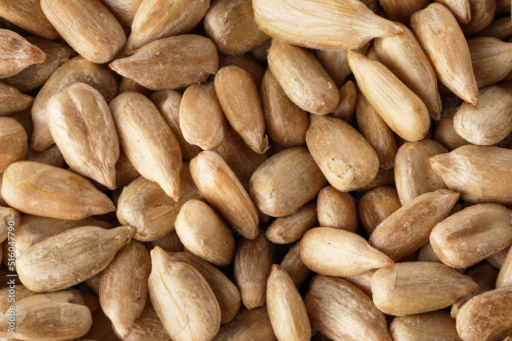 Closeup view of peeled sunflower seeds as background Closeup view of peeled sunflower seeds as background