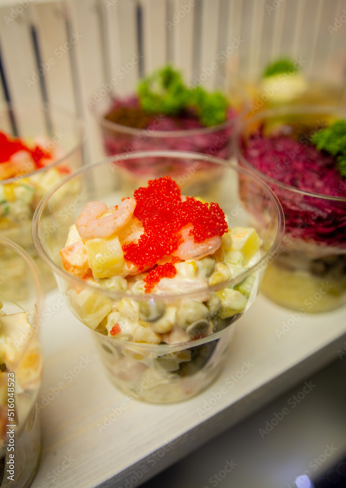 A set of festive salads on the table A set of festive salads on the table