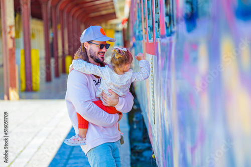 father with her child in love on the railway station in varna bulgaria 