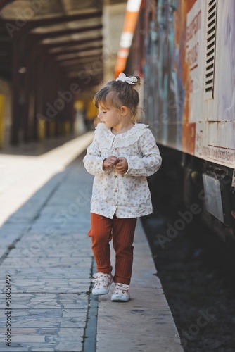 child is walking on the railway station in varna bulgaria child portrait