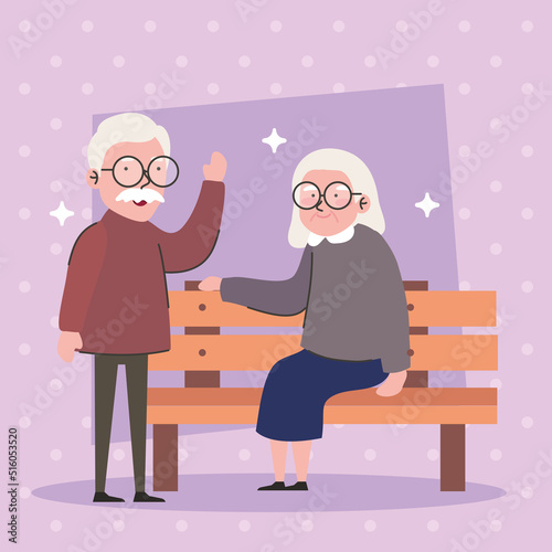 grandparents couple in park chair