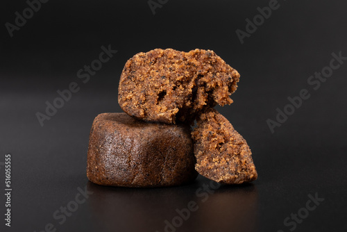 high thc cannabis, concentrate marijuana in the form of hashish amber trichomes on dark background.