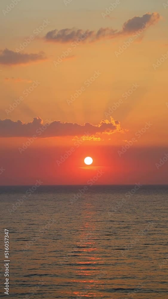 aerial shot of sunset over the sea. Vertical video for social media. aerial shot of sunset over the sea. Vertical video for social media.