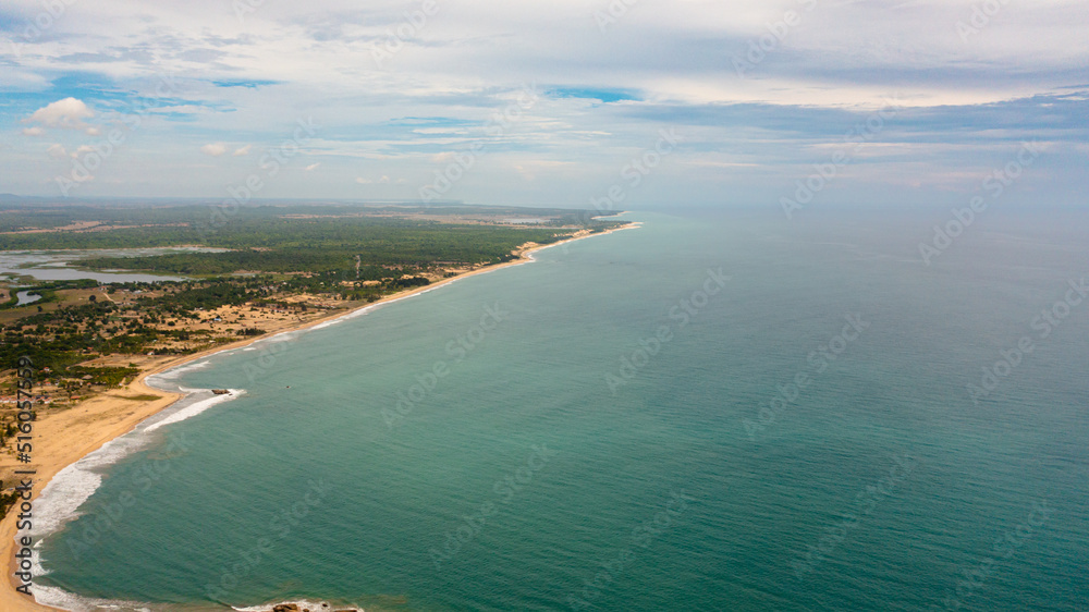 Top view of landscape of Sri Lanka. View from the ocean to agricultural land.