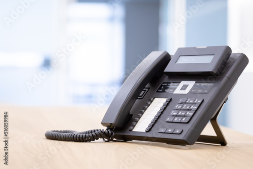 Close up telephone landline at office concept Communication support, call center and customer service help desk.for (call center) concept.
