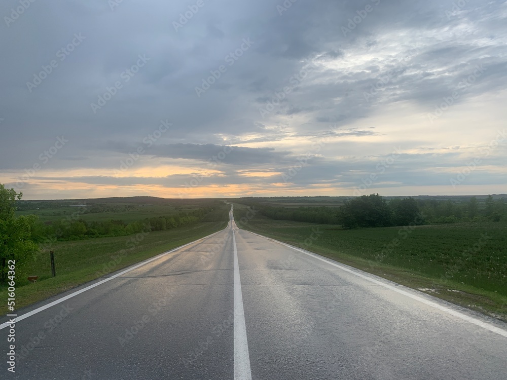 Straight asphalt rural road