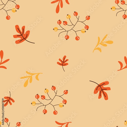 Autumn seamless pattern with cartoon oak leaves and rowan berries