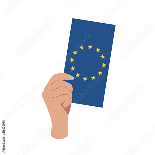 Hand holding the flag of the European Union isolated on a white background.