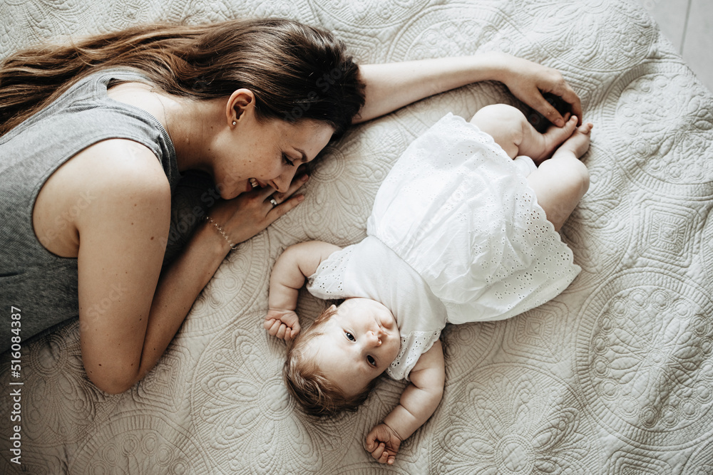 Baby sleeps with mather on the bed Baby sleeps with mather on the bed