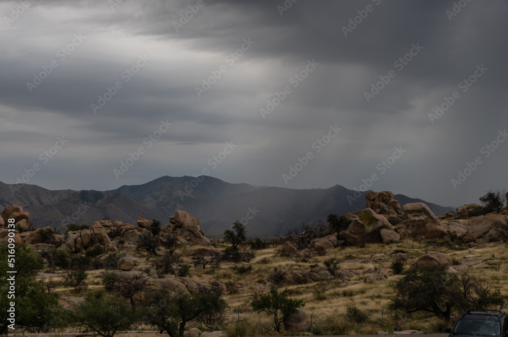 Scenic rock formation in south east Arizona under dramatic monsoonal sky