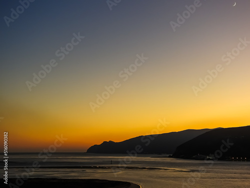 Golden sunset at Troia Beach, Setubal, Portugal. Wonderful colors.