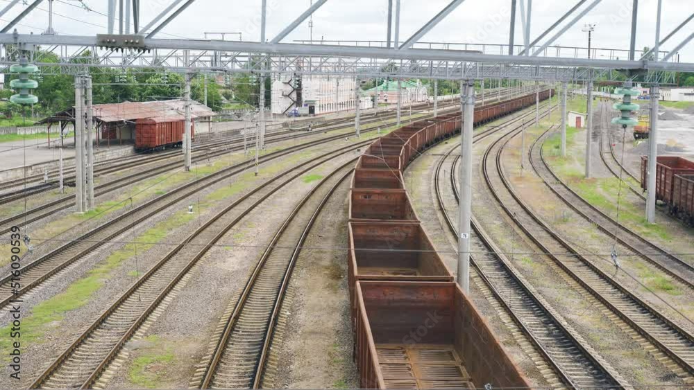 Top view of the empty wagons of a freight train standing on the railroad. A crisis. Rail transport concept Top view of the empty wagons of a freight train standing on the railroad. A crisis. Rail transport concept