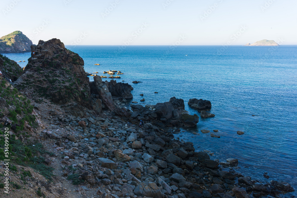 Wonderful view of Eo Gio beach- A tourist attraction in Quy Nhon- Vietnam with blue water and high rock cliffs