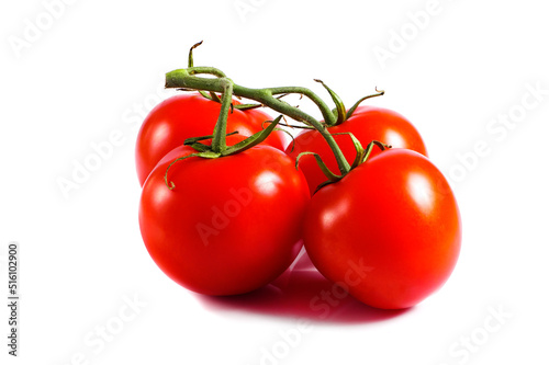 vine of ripe tomatoes isolated on white background